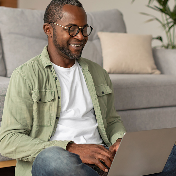 A man using a laptop at home