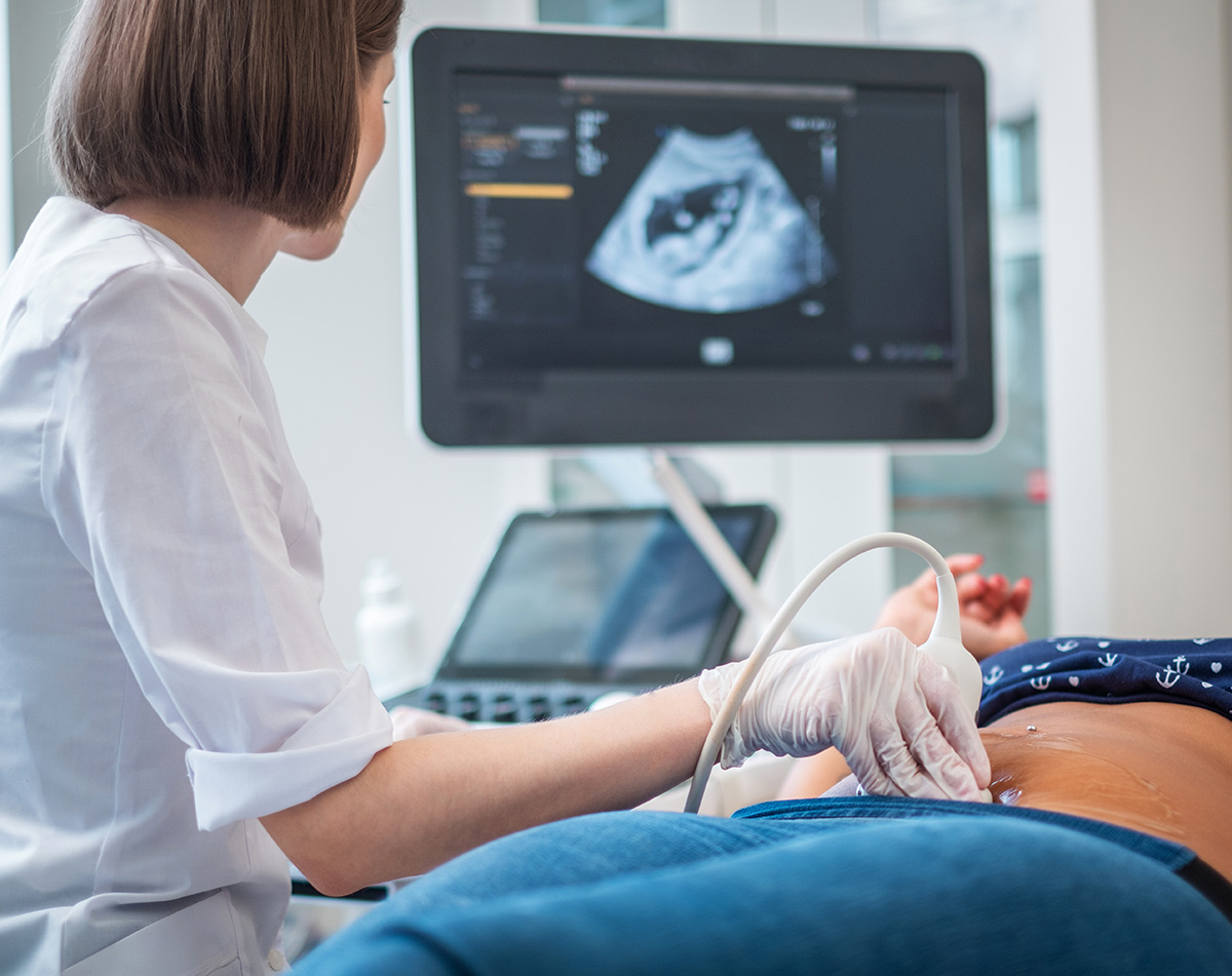 Pregnant woman on utltrasonographic examination at hospital 