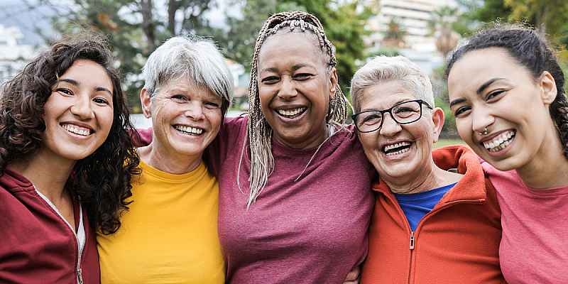 A group of women walking outdoors.