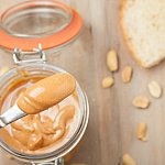 A small amount of peanut butter on a knife.